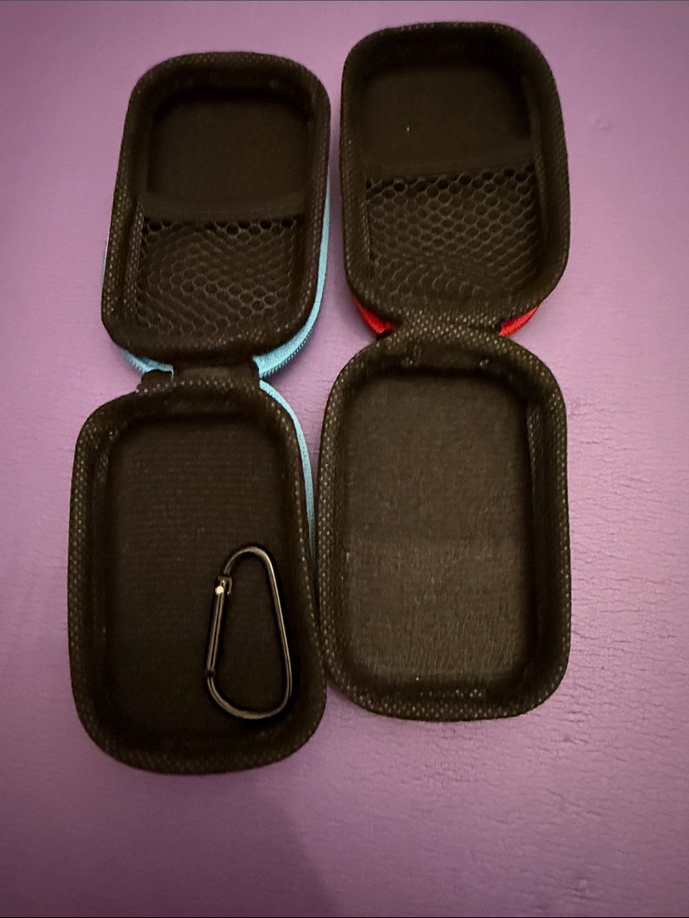 Compact Black Earbud Travel Case with Blue and Red Trim - Protective Hard Shell